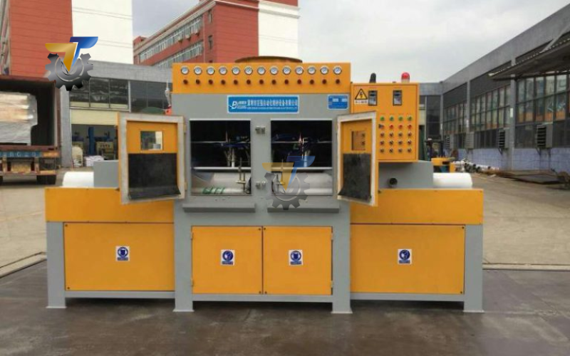 máy phun cát băng tải tự động