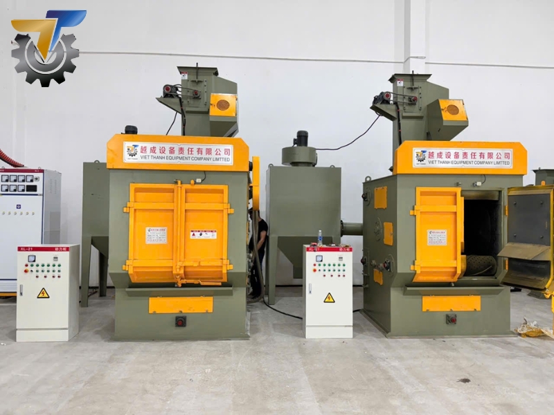 Máy phun bi lồng xoay